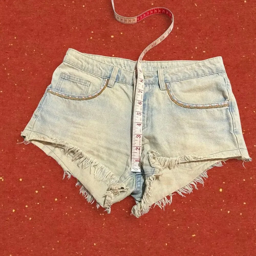 Distressed denim shorts